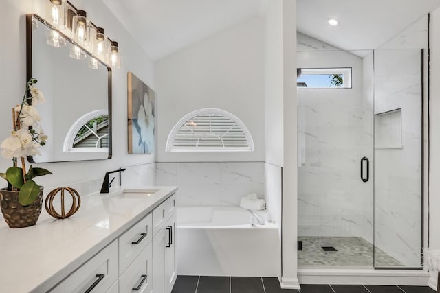 7612 Cascade Way, Gurnee, IL 60031 - bathroom featuring a bath, vanity, vaulted ceiling, a marble finish shower, and tile patterned floors