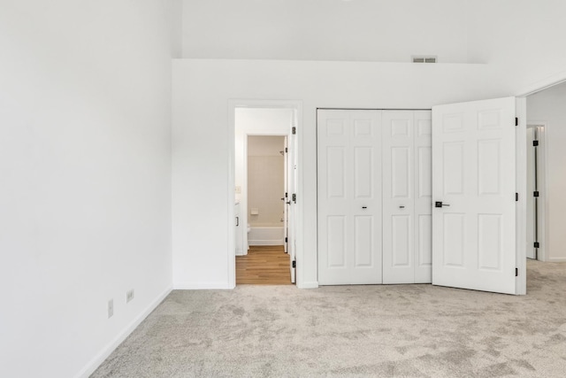 7612 Cascade Way, Gurnee, IL 60031 - unfurnished bedroom with carpet, a closet, and ensuite bathroom