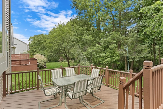 7612 Cascade Way, Gurnee, IL 60031 - wooden terrace with outdoor dining area and a yard
