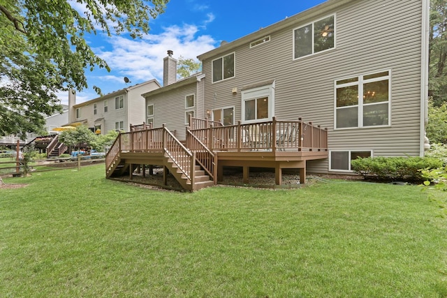 7612 Cascade Way, Gurnee, IL 60031 - back of property featuring stairs, a deck, and a yard