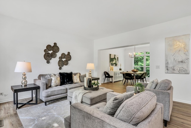7612 Cascade Way, Gurnee, IL 60031 - living area featuring a chandelier and wood finished floors