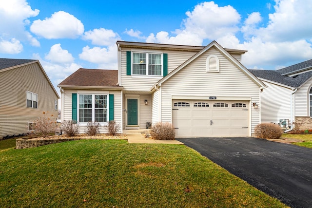 1792 Autumn Woods Ln, Romeoville, IL 60446 - traditional-style home featuring driveway, a front lawn, and an attached garage