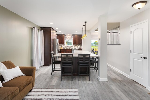 1792 Autumn Woods Ln, Romeoville, IL 60446 - dining space featuring light wood-style floors and recessed lighting