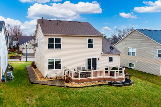 1792 Autumn Woods Ln, Romeoville, IL 60446 - back of house with a yard, a shingled roof, and a wooden deck