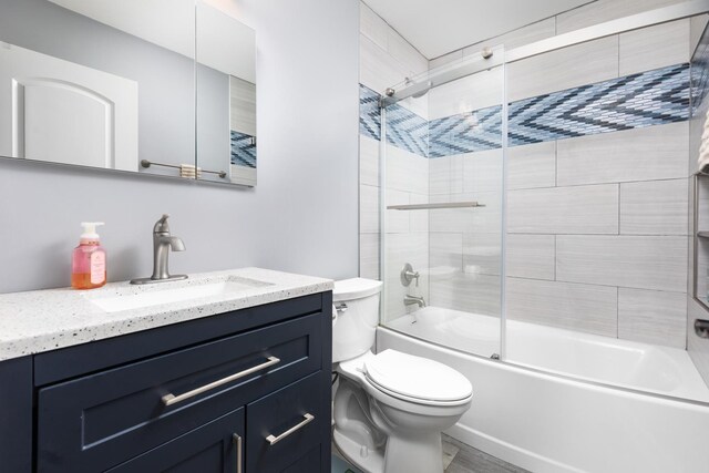 1792 Autumn Woods Ln, Romeoville, IL 60446 - bathroom featuring vanity, shower / bath combination with glass door, and wood finished floors