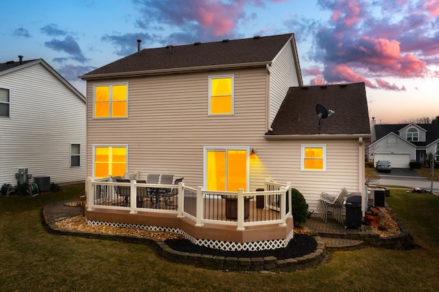 1792 Autumn Woods Ln, Romeoville, IL 60446 - rear view of property with a yard, a deck, roof with shingles, and outdoor dining area