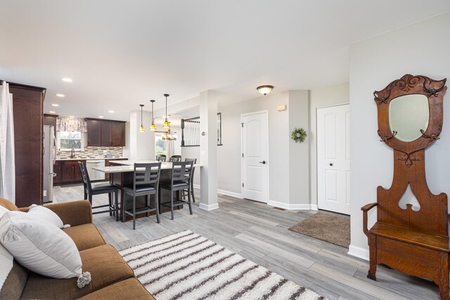 1792 Autumn Woods Ln, Romeoville, IL 60446 - living area featuring light wood-style flooring and recessed lighting