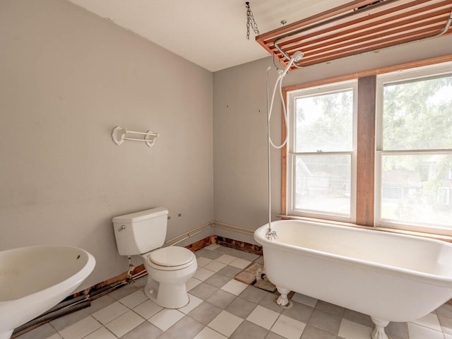 514 N St, Crete, IL 60417 - bathroom featuring a freestanding tub and tile patterned floors