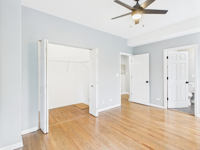 1729 E 67th St Unit 2E, Chicago, IL 60649 - unfurnished bedroom featuring light wood-type flooring, a closet, and a ceiling fan