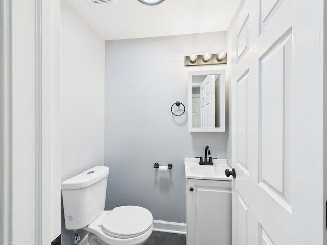 1729 E 67th St Unit 2E, Chicago, IL 60649 - half bathroom featuring vanity and toilet