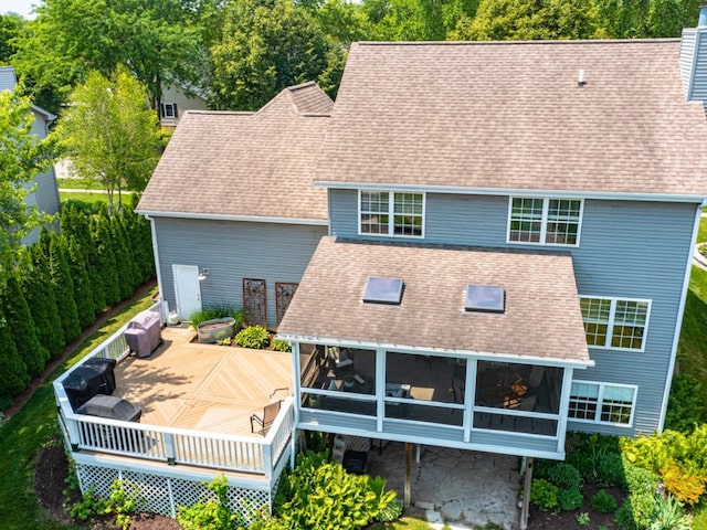 569 Ryan Way, Crystal Lake, IL 60012 - rear view of property featuring a sunroom, a wooden deck, and a shingled roof