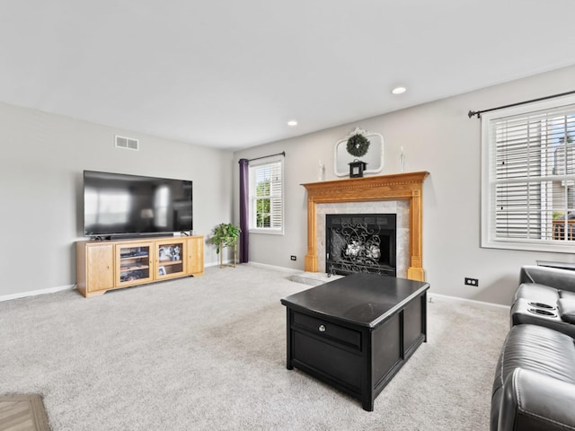 569 Ryan Way, Crystal Lake, IL 60012 - living room with a fireplace, light carpet, and recessed lighting