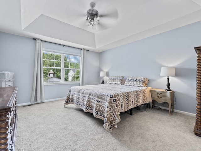 569 Ryan Way, Crystal Lake, IL 60012 - carpeted bedroom featuring a raised ceiling and a ceiling fan