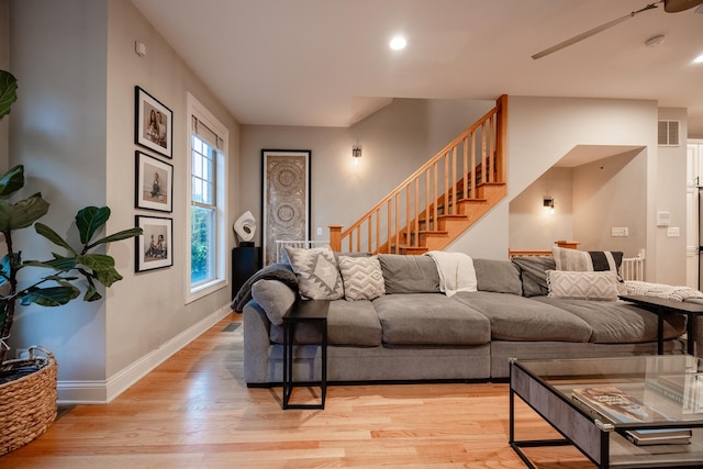 3457 N Whipple St, Chicago, IL 60618 - living area with light wood-style floors, stairs, a ceiling fan, and recessed lighting