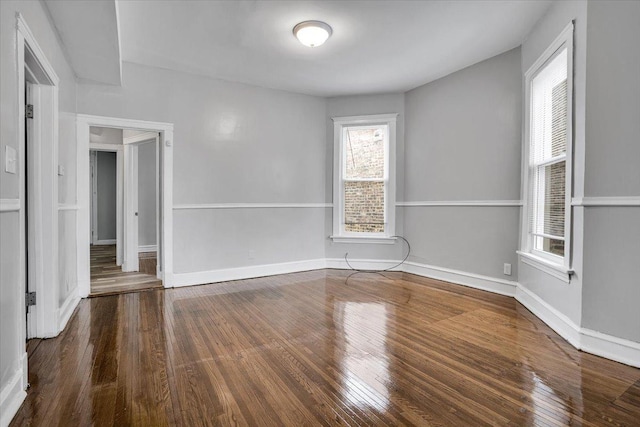 4336 W Adams St, Chicago, IL 60624 - empty room featuring wood-type flooring and baseboards