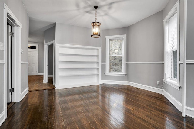 4336 W Adams St, Chicago, IL 60624 - unfurnished dining area with wood finished floors and a chandelier