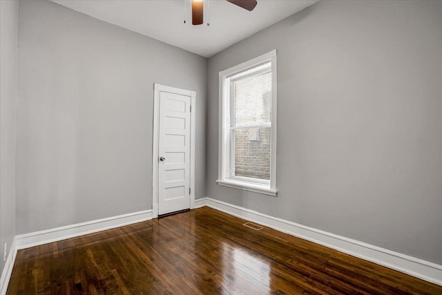 4336 W Adams St, Chicago, IL 60624 - empty room with a ceiling fan and dark wood-style flooring