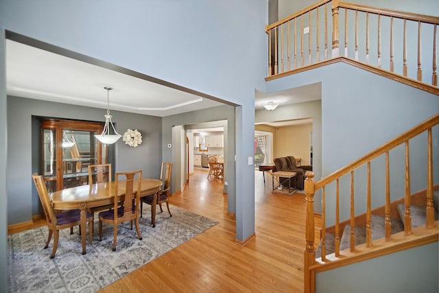 2870 Gannet Ln, New Lenox, IL 60451 - dining space featuring wood finished floors and stairway