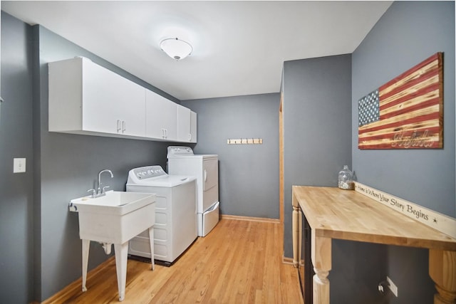 2870 Gannet Ln, New Lenox, IL 60451 - washroom with cabinet space, washer and dryer, and light wood finished floors
