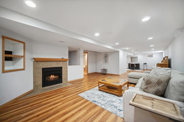 2870 Gannet Ln, New Lenox, IL 60451 - living room featuring wood finished floors, a fireplace, and recessed lighting