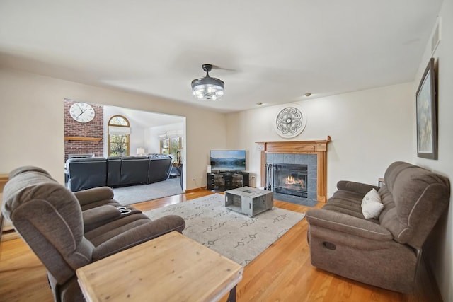 2870 Gannet Ln, New Lenox, IL 60451 - living room with a tile fireplace and wood finished floors