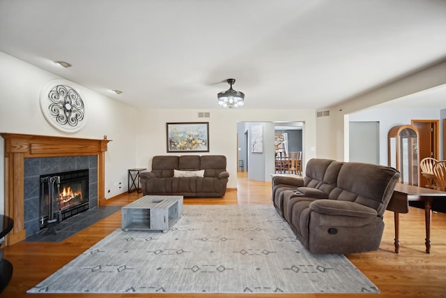 2870 Gannet Ln, New Lenox, IL 60451 - living room with wood finished floors and a tile fireplace