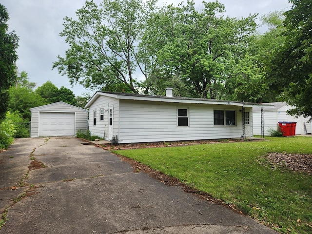 1313 Hollycrest Dr, Champaign, IL 61821 - single story home with an outdoor structure, a front yard, driveway, and a garage