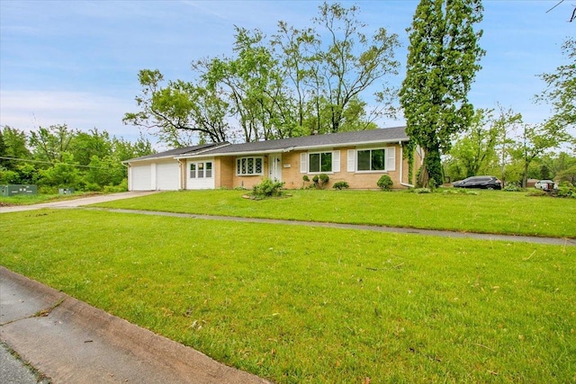 549 Allen Ln, University Park, IL 60484 - ranch-style home with a garage, concrete driveway, and a front lawn