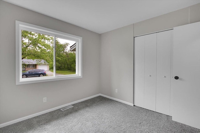 549 Allen Ln, University Park, IL 60484 - unfurnished bedroom featuring carpet floors and a closet