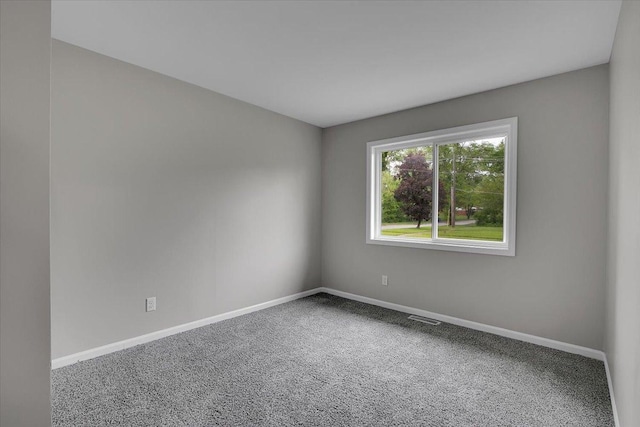 549 Allen Ln, University Park, IL 60484 - carpeted spare room featuring baseboards