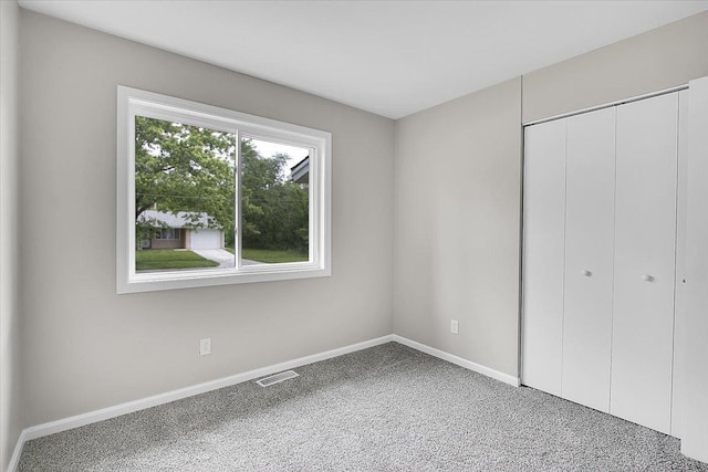 549 Allen Ln, University Park, IL 60484 - unfurnished bedroom with carpet flooring and a closet