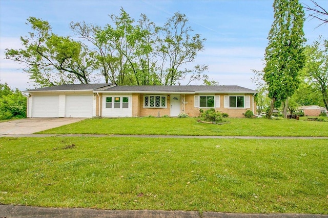 549 Allen Ln, University Park, IL 60484 - ranch-style home with an attached garage, concrete driveway, and a front lawn