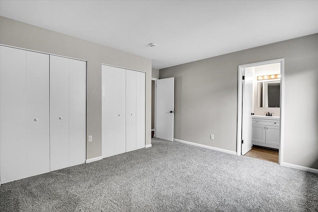 549 Allen Ln, University Park, IL 60484 - unfurnished bedroom with multiple closets, carpet flooring, and ensuite bath