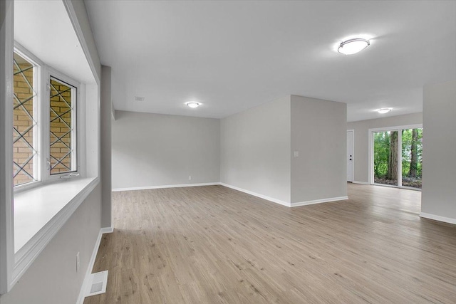 549 Allen Ln, University Park, IL 60484 - empty room featuring wood finished floors and baseboards