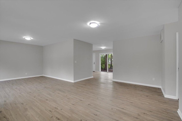 549 Allen Ln, University Park, IL 60484 - empty room featuring light wood-style flooring and baseboards