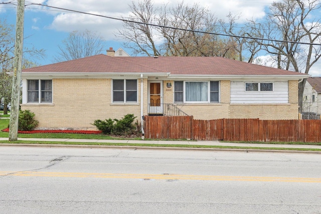 5800 Prospect Ave, Berkeley, IL 60163 - ranch-style home with brick siding, a chimney, and a shingled roof