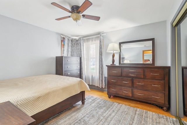 5800 Prospect Ave, Berkeley, IL 60163 - bedroom with light wood-style flooring, a closet, and a ceiling fan