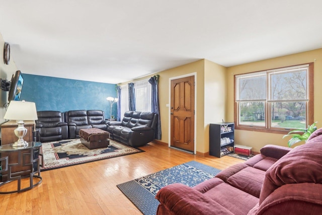 5800 Prospect Ave, Berkeley, IL 60163 - living room featuring wood-type flooring and an accent wall