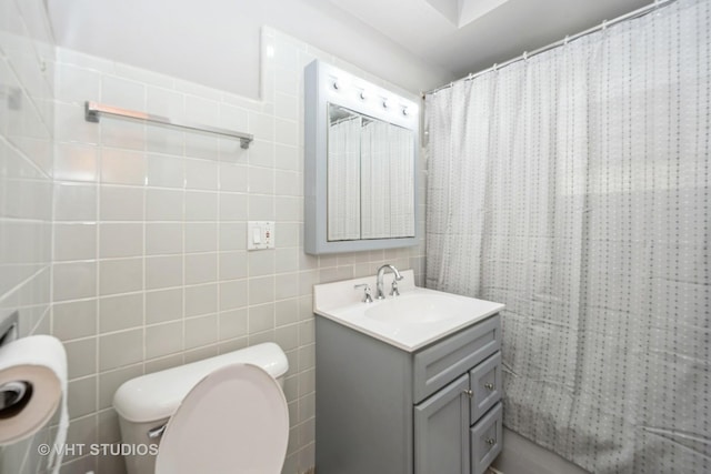 5404 W Henderson St, Chicago, IL 60641 - bathroom with vanity, tile walls, and a shower with shower curtain
