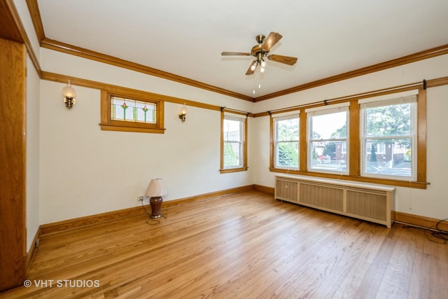 5404 W Henderson St, Chicago, IL 60641 - empty room with radiator, light wood-style flooring, a ceiling fan, and ornamental molding