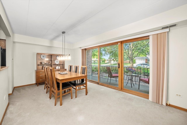 7515 Sheridan Dr Unit 1D, Willowbrook, IL 60527 - dining space with carpet and a chandelier