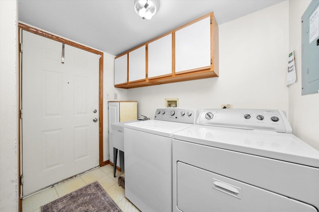 7515 Sheridan Dr Unit 1D, Willowbrook, IL 60527 - laundry room featuring cabinet space, washer and clothes dryer, and electric panel