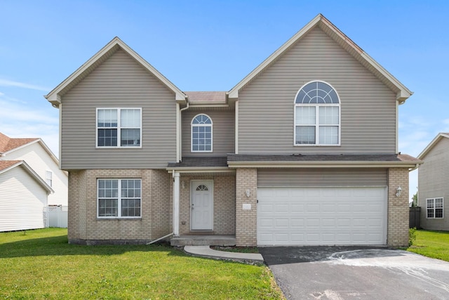 25813 S Geranium Ln, Monee, IL 60449 - traditional-style house featuring a garage, brick siding, driveway, and a front yard