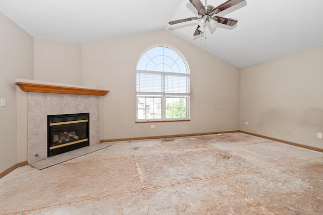 25813 S Geranium Ln, Monee, IL 60449 - unfurnished living room featuring a tiled fireplace, lofted ceiling, and ceiling fan