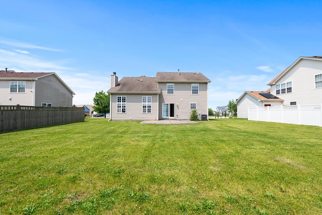 25813 S Geranium Ln, Monee, IL 60449 - back of property with a patio and a chimney