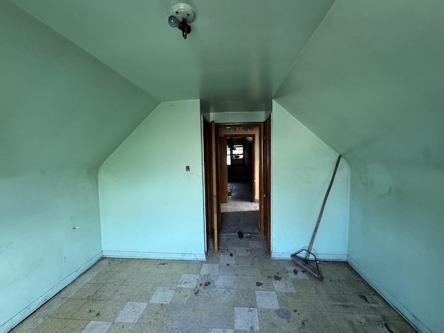 8371 S Baltimore Ave, Chicago, IL 60617 - additional living space featuring vaulted ceiling and baseboards