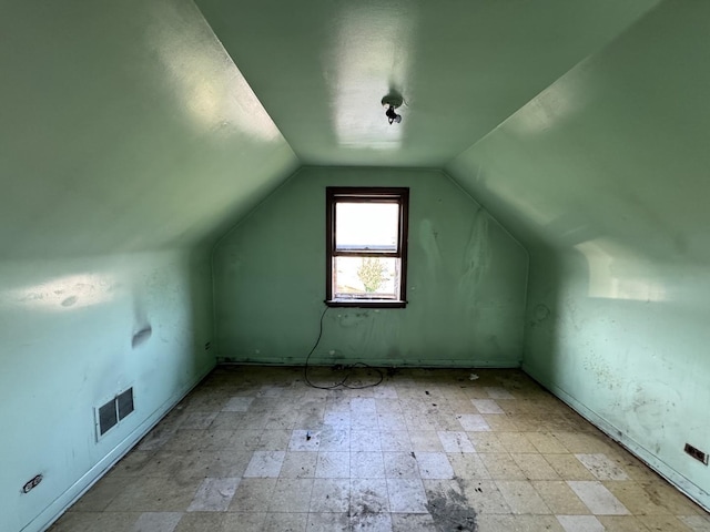 8371 S Baltimore Ave, Chicago, IL 60617 - additional living space featuring lofted ceiling and light floors