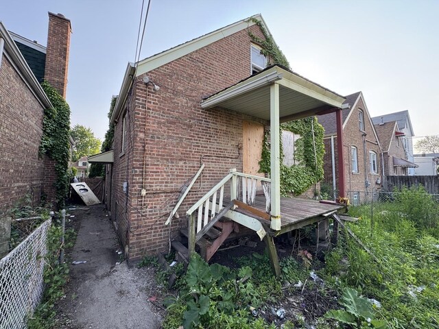 8371 S Baltimore Ave, Chicago, IL 60617 - rear view of property featuring brick siding