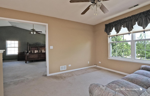 2467 W Autumn Dr, Round Lake, IL 60073 - sitting room featuring a ceiling fan, carpet, and lofted ceiling
