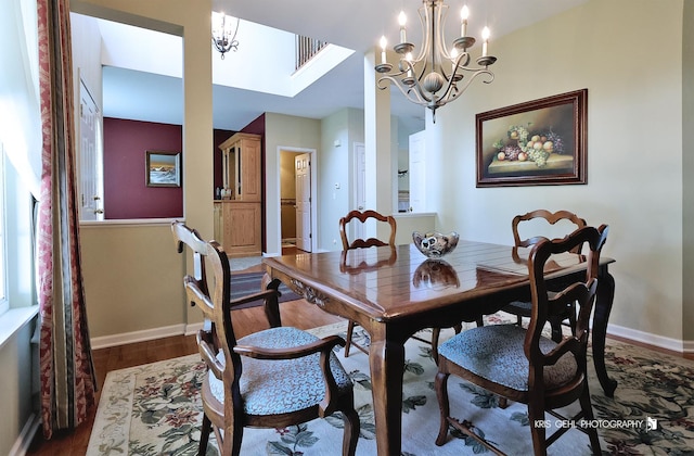 2467 W Autumn Dr, Round Lake, IL 60073 - dining space with wood finished floors and a chandelier